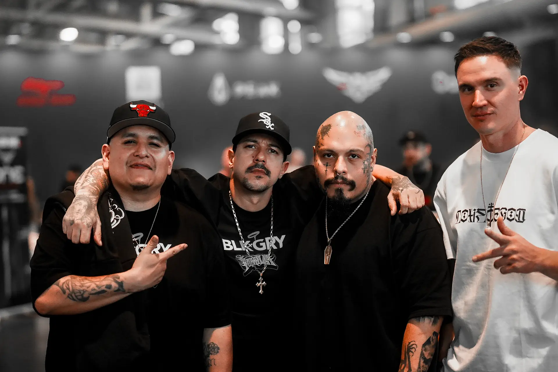 Crew of tattoo artists together at the convention